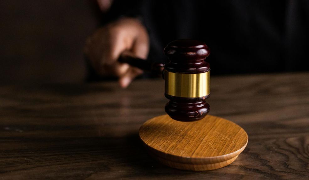 Brown Wooden Gavel on Brown Wooden Table