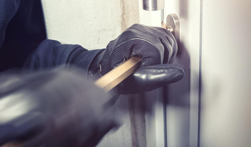 Person Opening a Door with a Bar