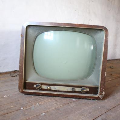 Vintage Brown Crt Tv on Parquet Wood Flooring